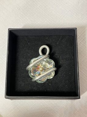 Iridescent Glass Flower Pendant with Silver Tone Wrap. Reiki Charged.